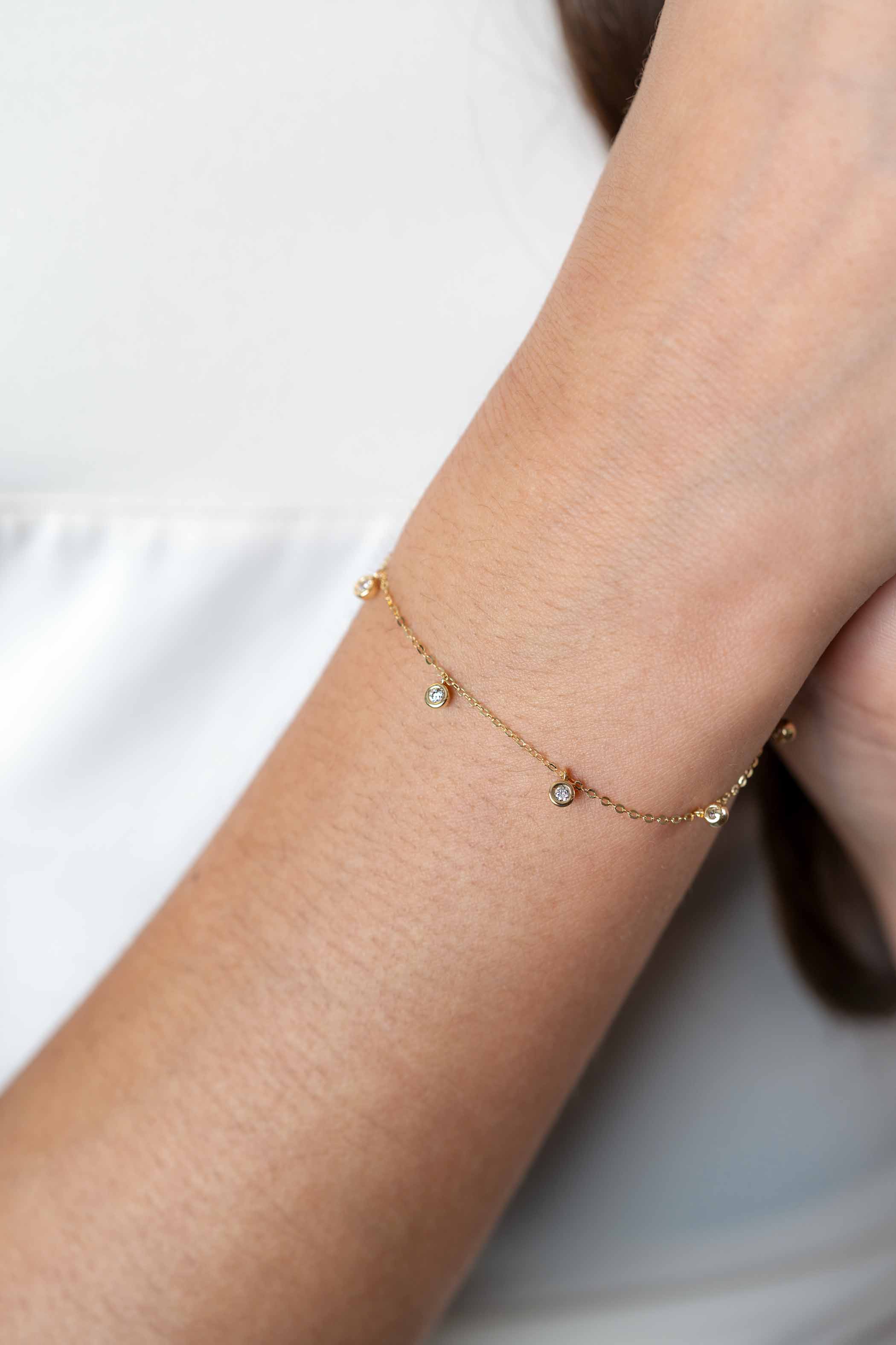 ZINZI 14K Gold Bracelet 7 Round Charms White Zirconias 15,5-18,5cm ZGA451