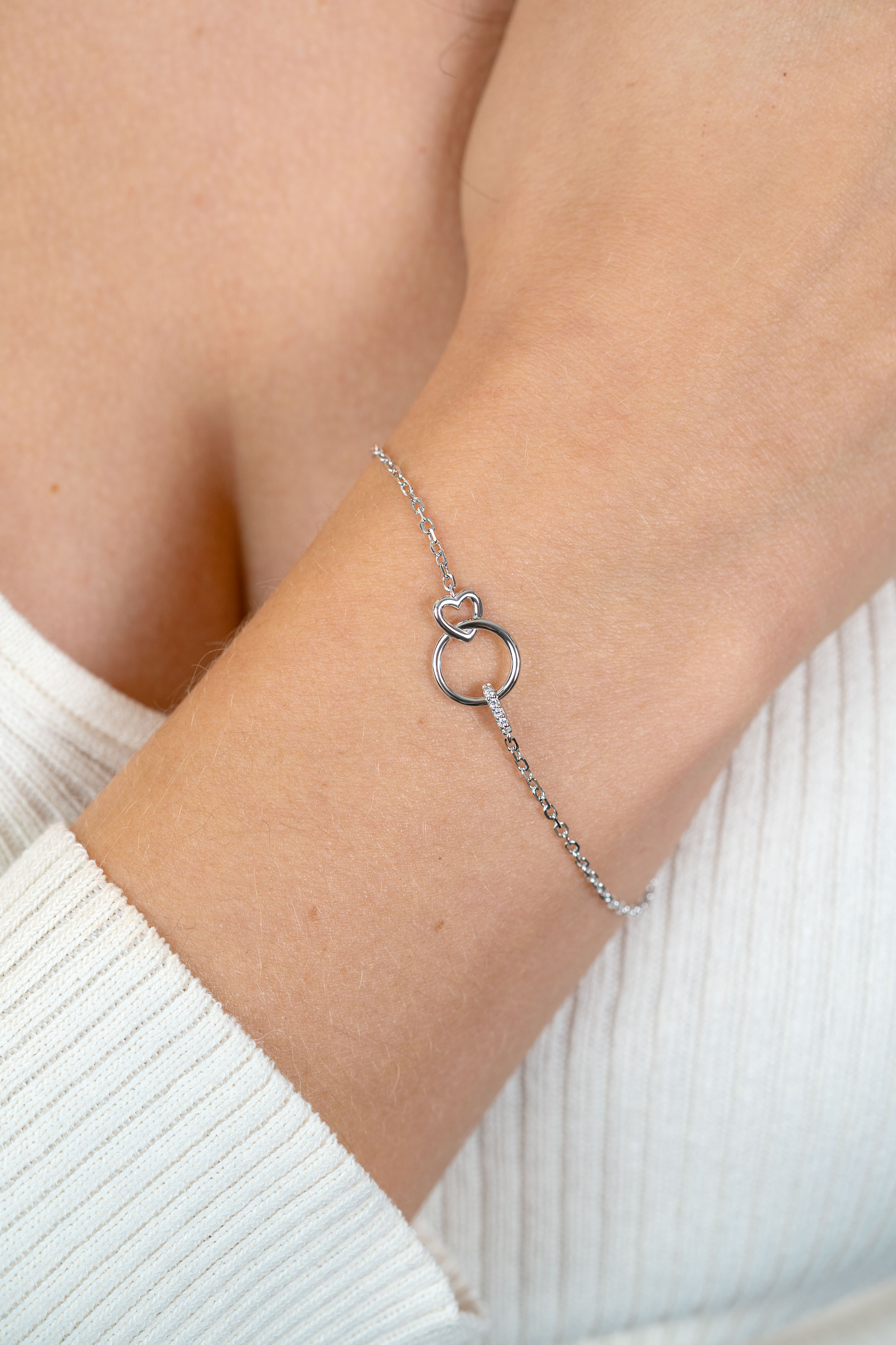 ZINZI zlv. armband verbonden rond/hart/oog met zirc.