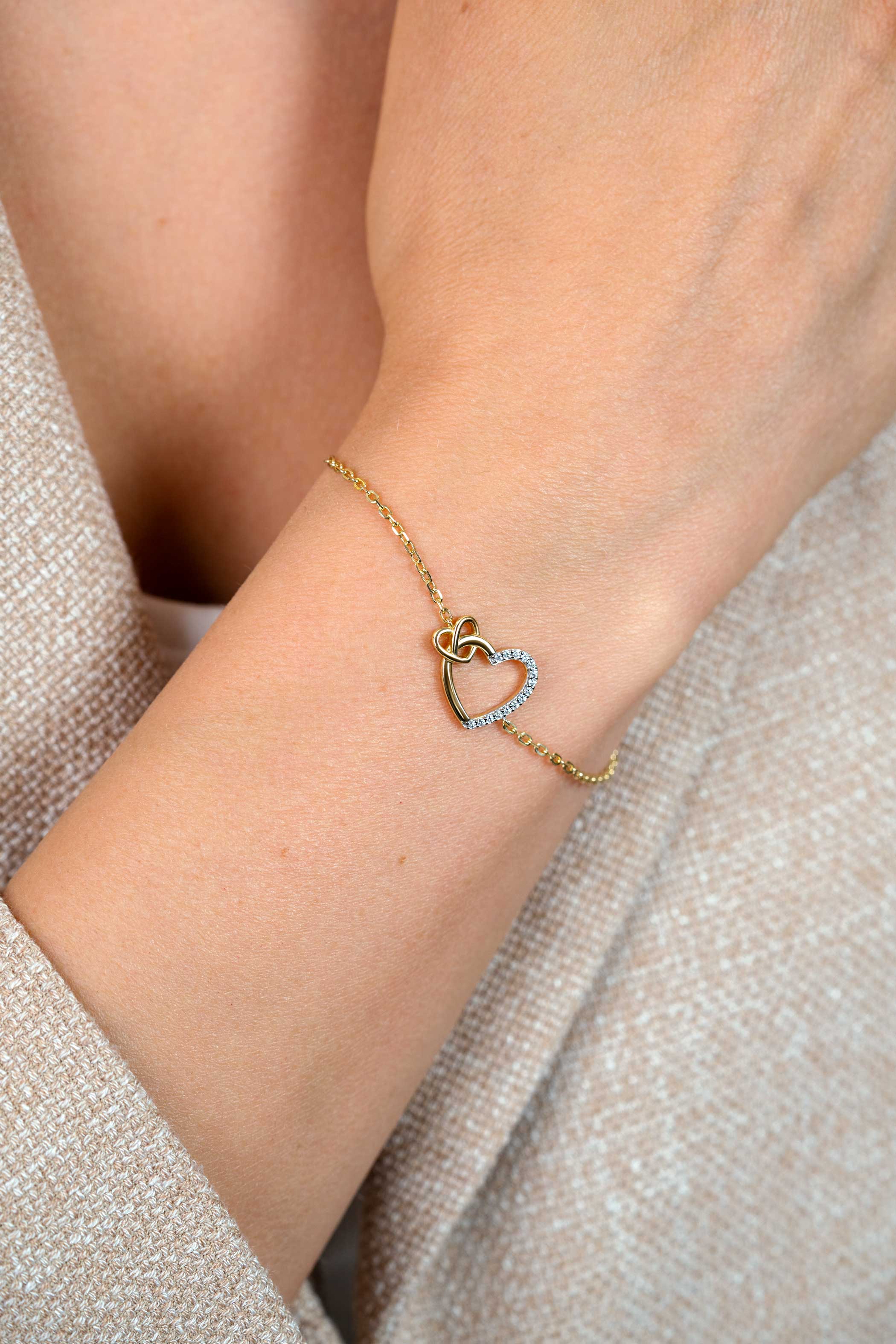 ZINZI zlv. armband gg.verg. 2 harten verbonden zirc.