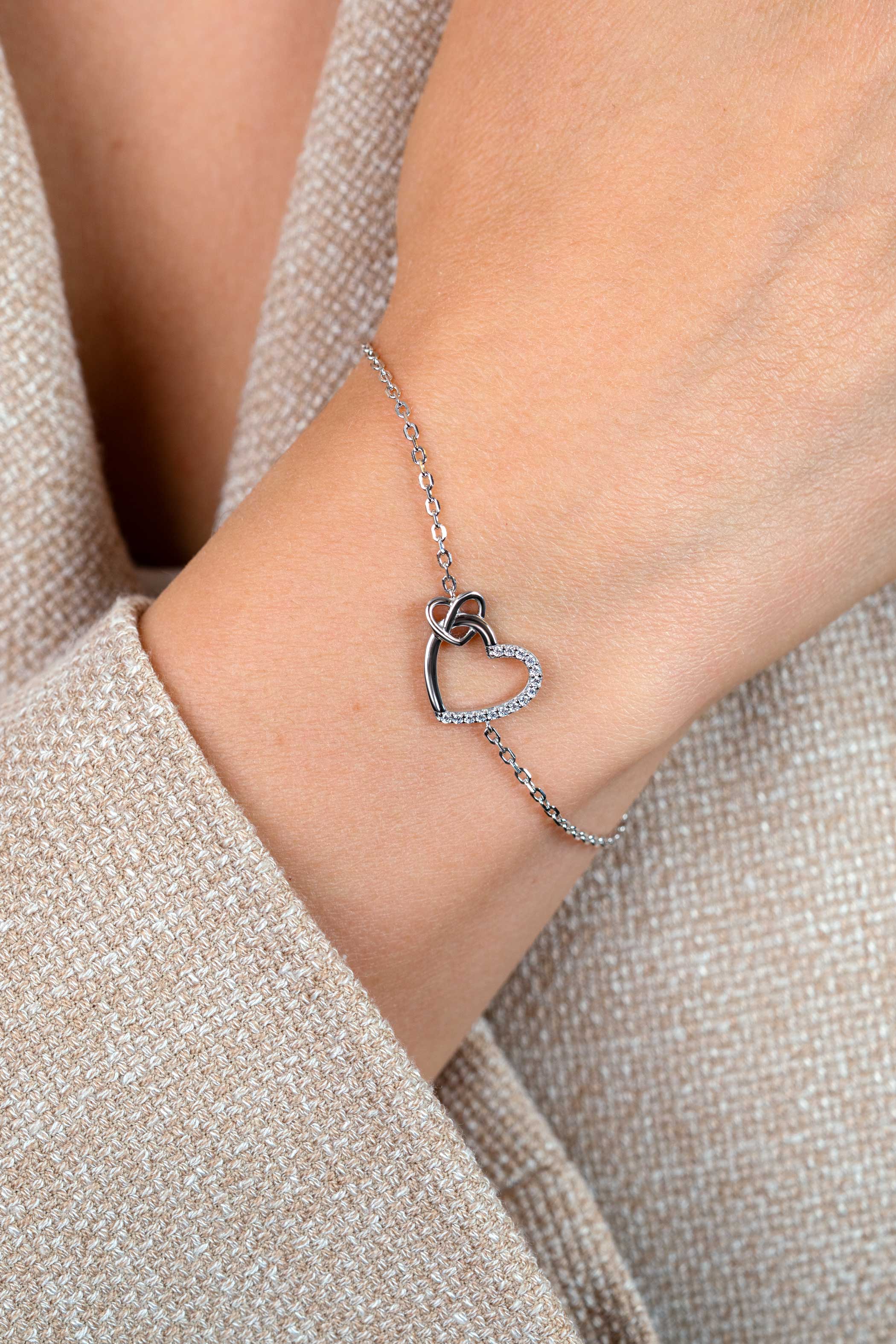 ZINZI zlv. armband twee harten verbonden zirc.