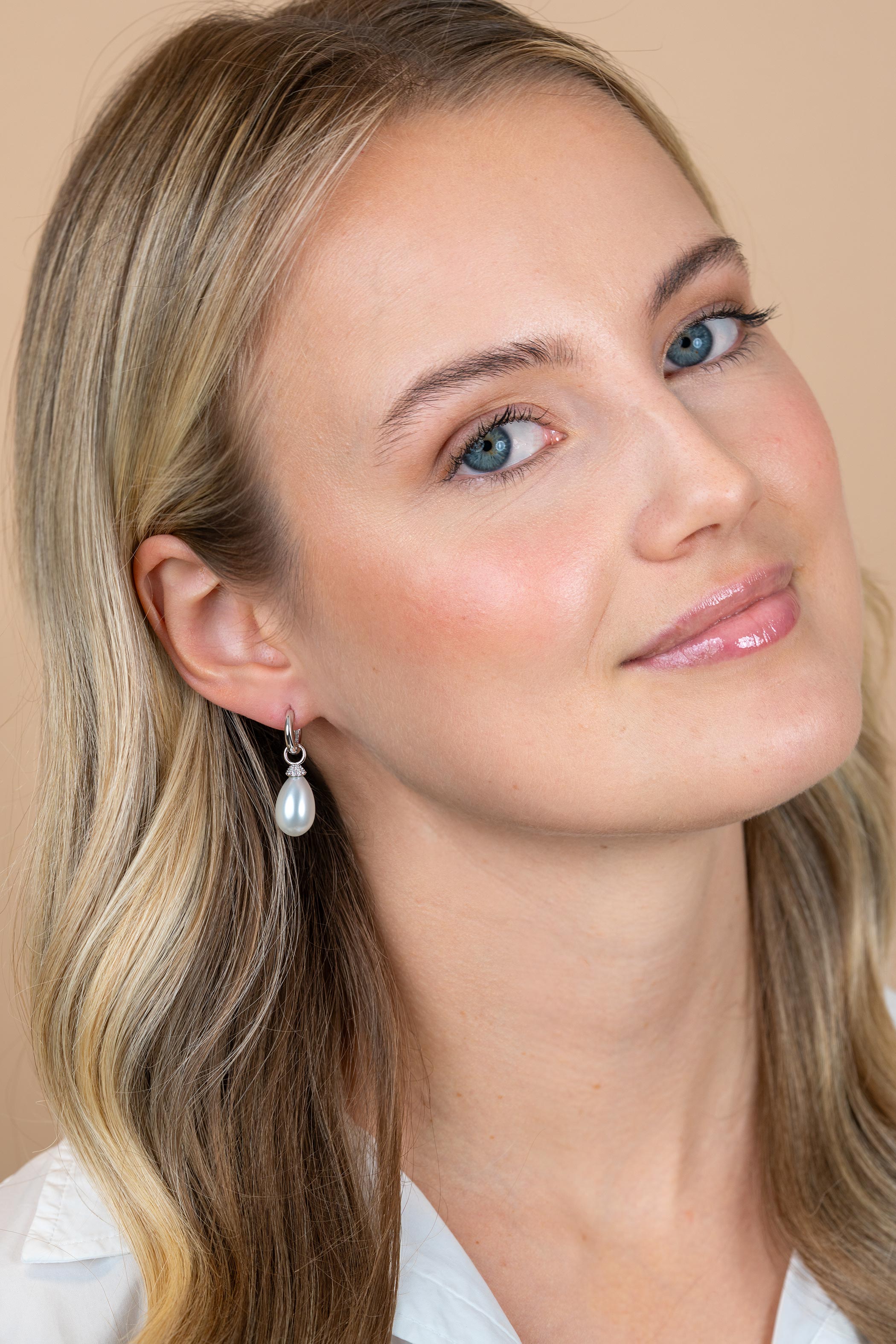 ZINZI zlv. oorbedels kapje zirc./druppelvorm parel