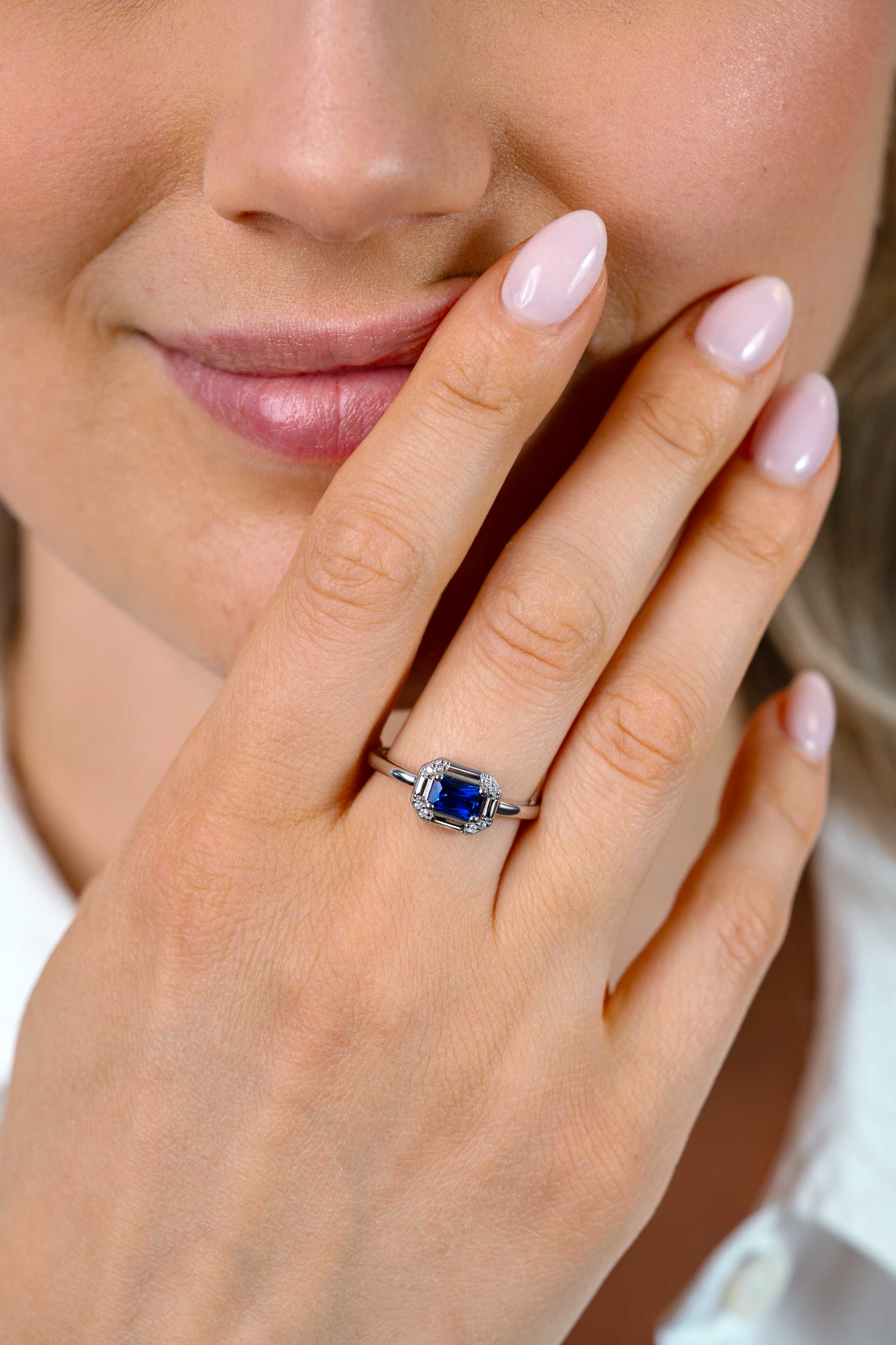 ZINZI zlv. ring rechthoek blauw en zirconia's mt.62