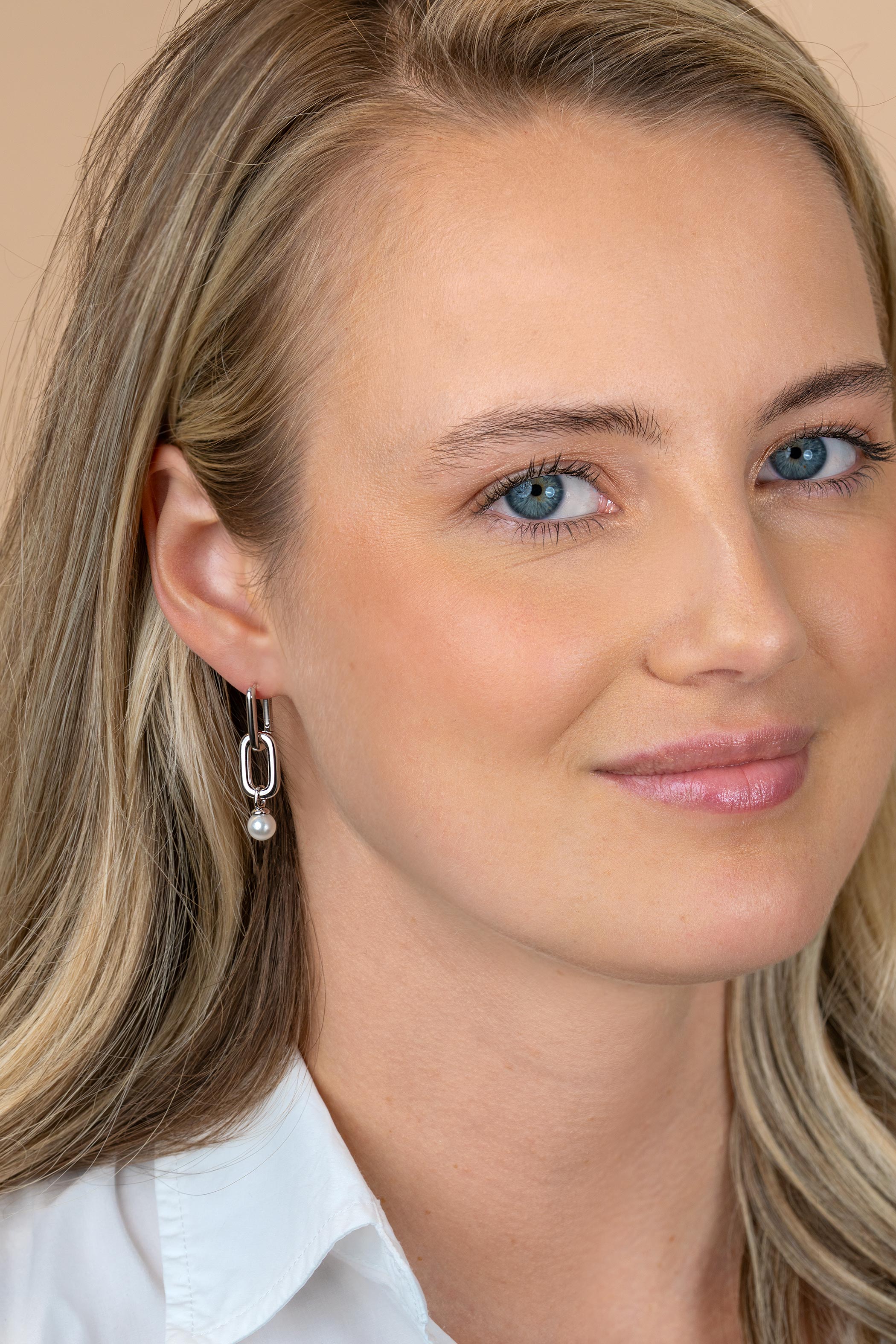 ZINZI zlv. oorbedels ovaal open en parel 6mm