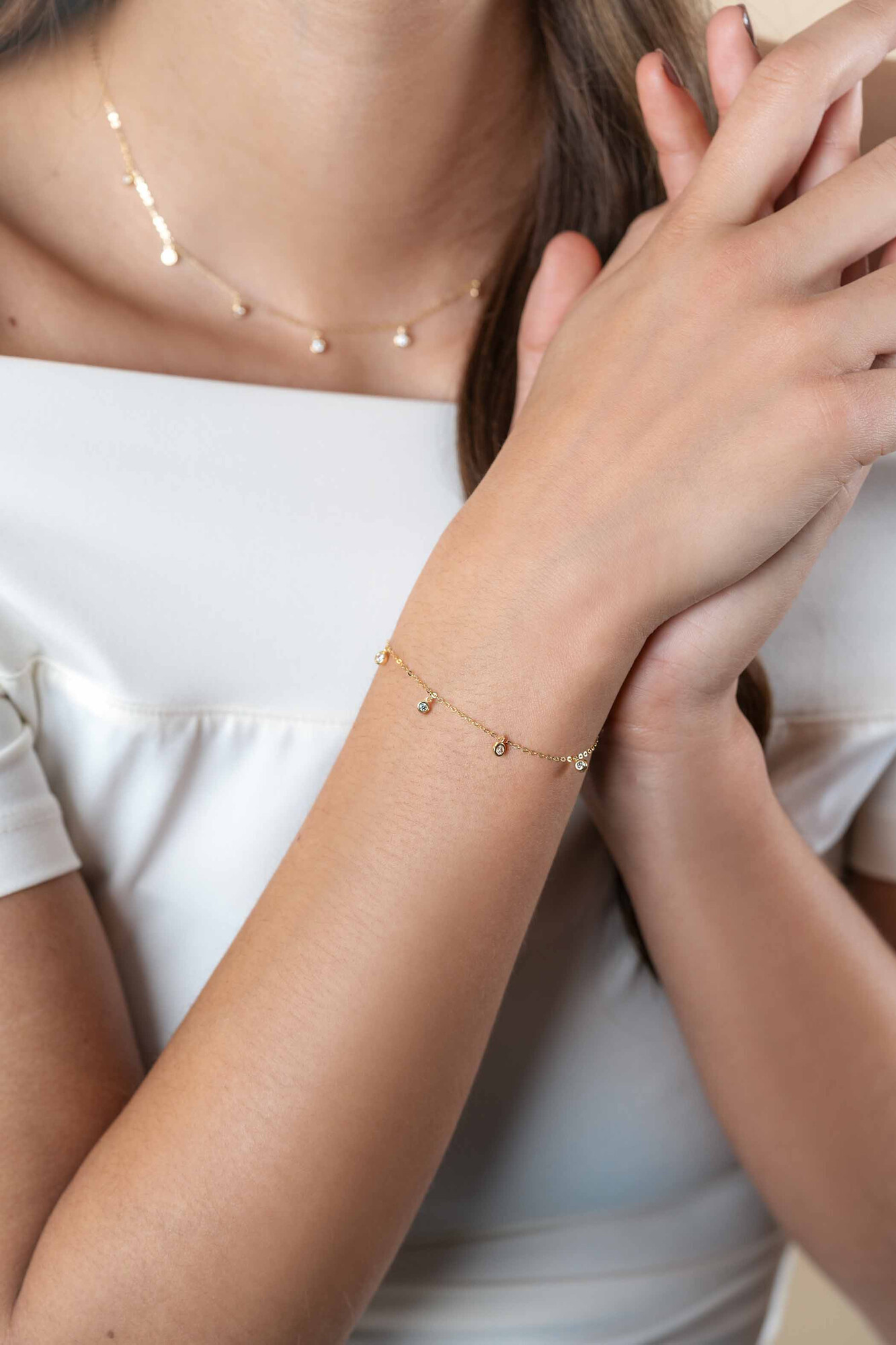 ZINZI 14K Gold Bracelet 7 Round Charms White Zirconias 15,5-18,5cm ZGA451