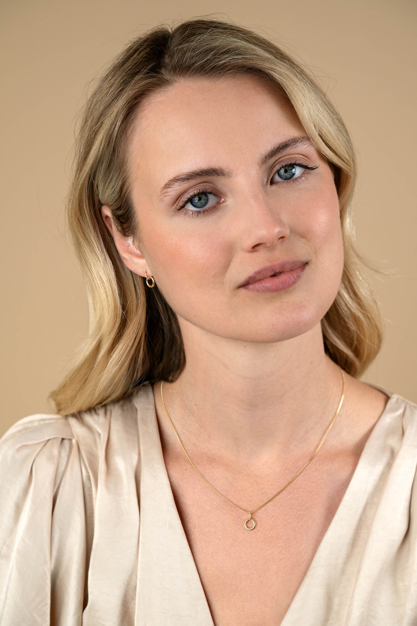 11mm ZINZI Gold 14 ct gold round stud earrings with tops set with white cubic zirconias ZGO512