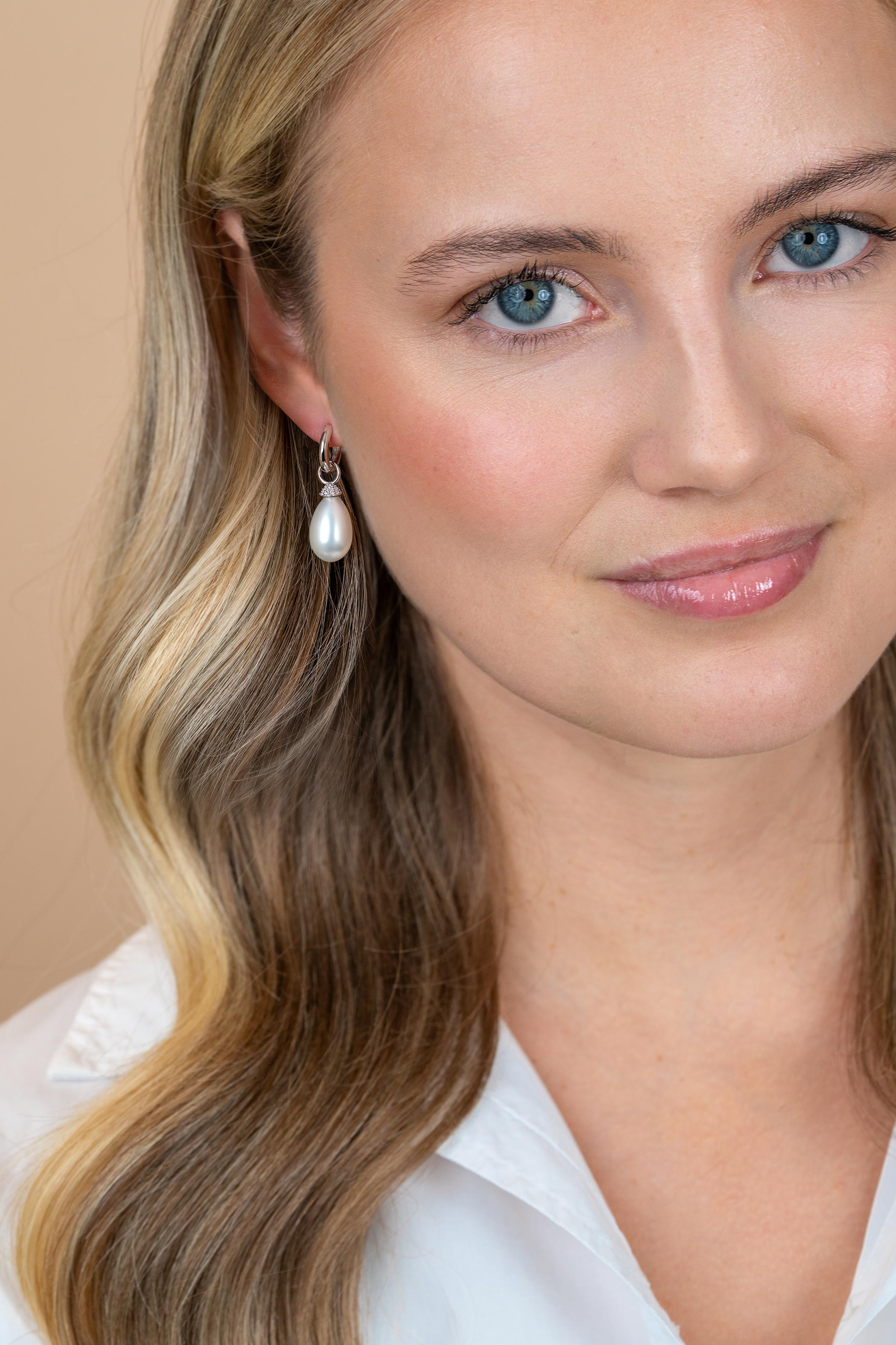 ZINZI zlv. oorbedels kapje zirc./druppelvorm parel