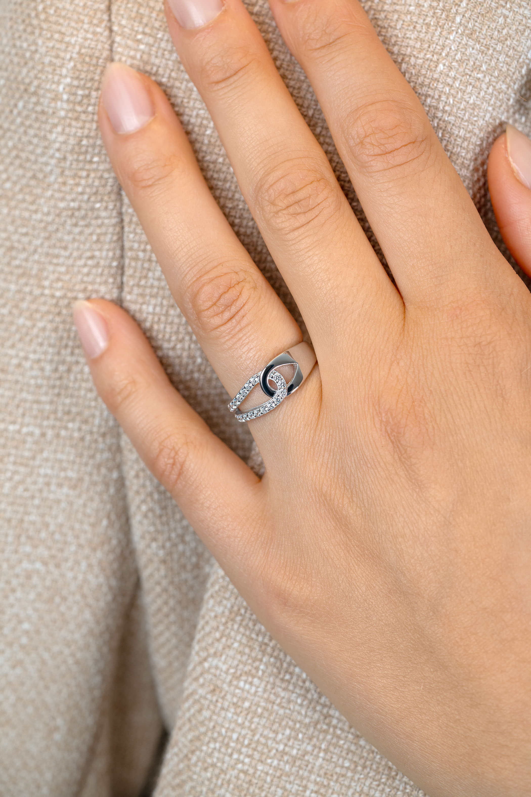 ZINZI zlv.ring verbonden druppelvorm zirc./glad mt.50