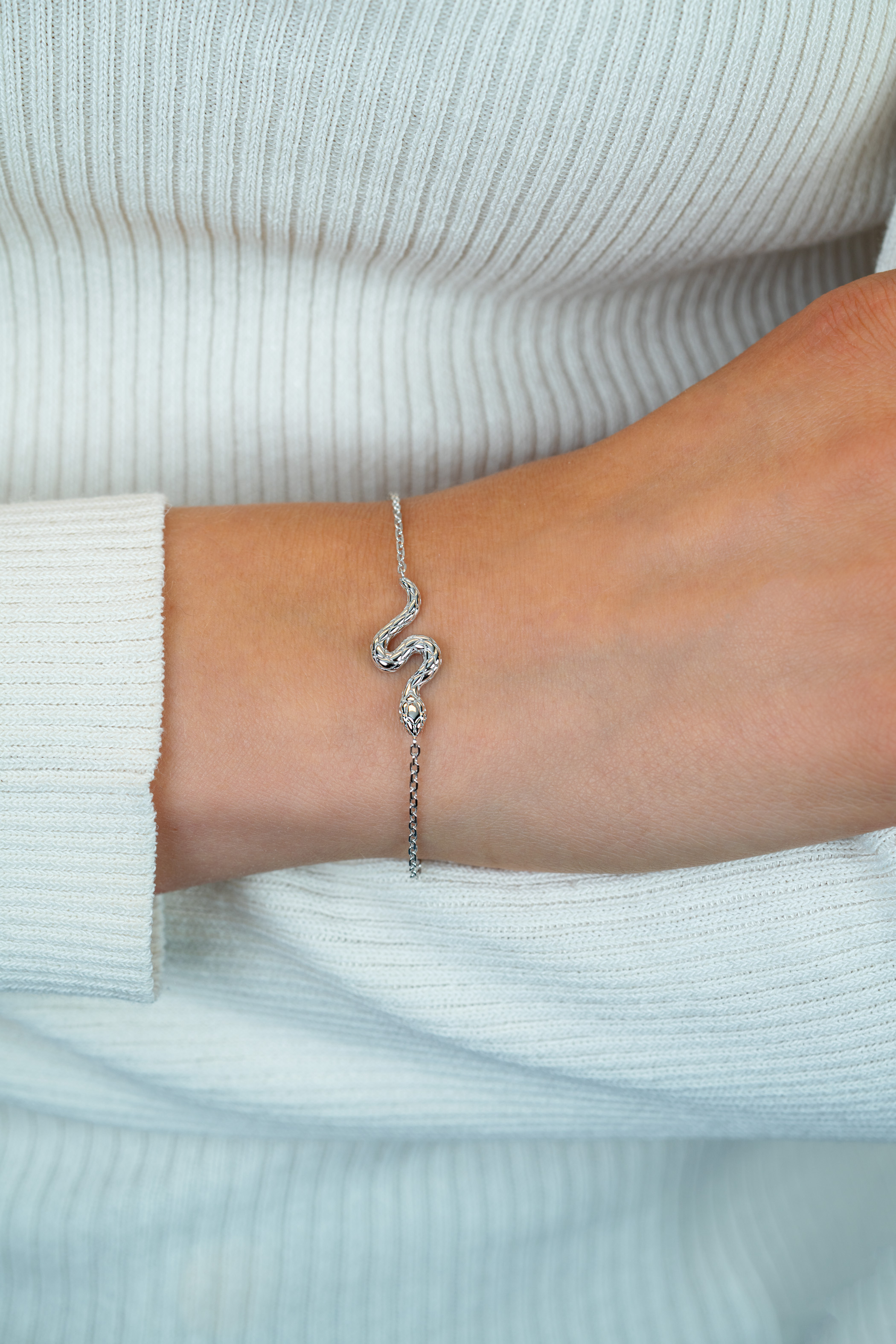 ZINZI zlv. armband met slang ertussen zirc.ogen