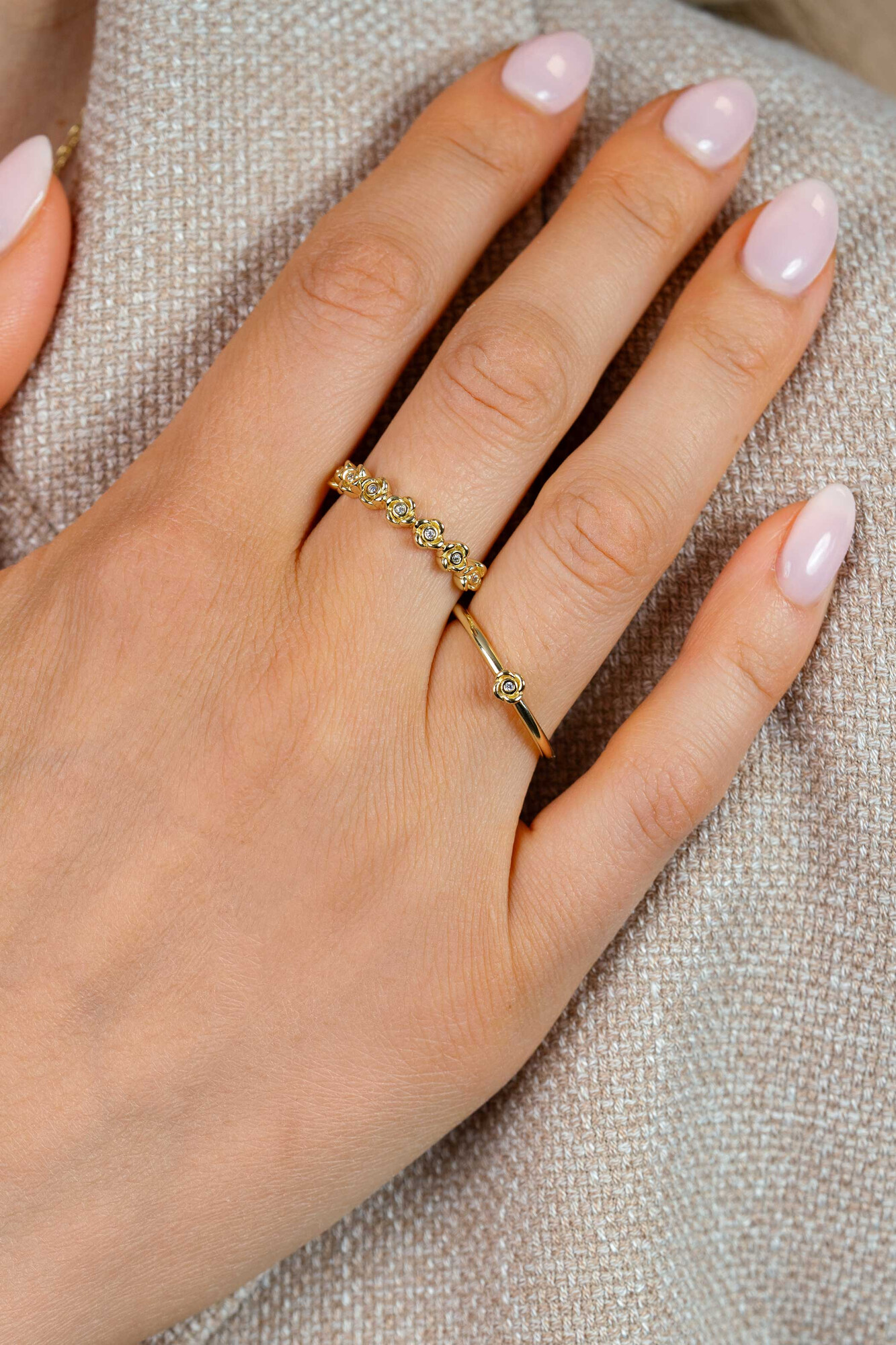 ZINZI zlv. ring gg.verg. 7 roosjes en zirconia's mt.62