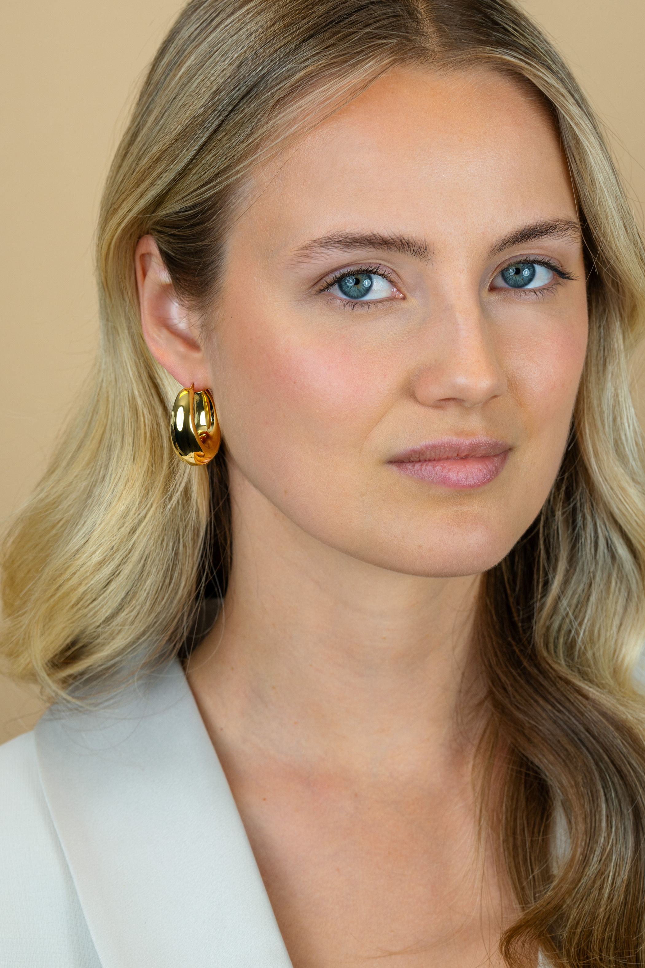 ZINZI zlv. oorringen gg.verg.ovaal aflopend 31x14mm