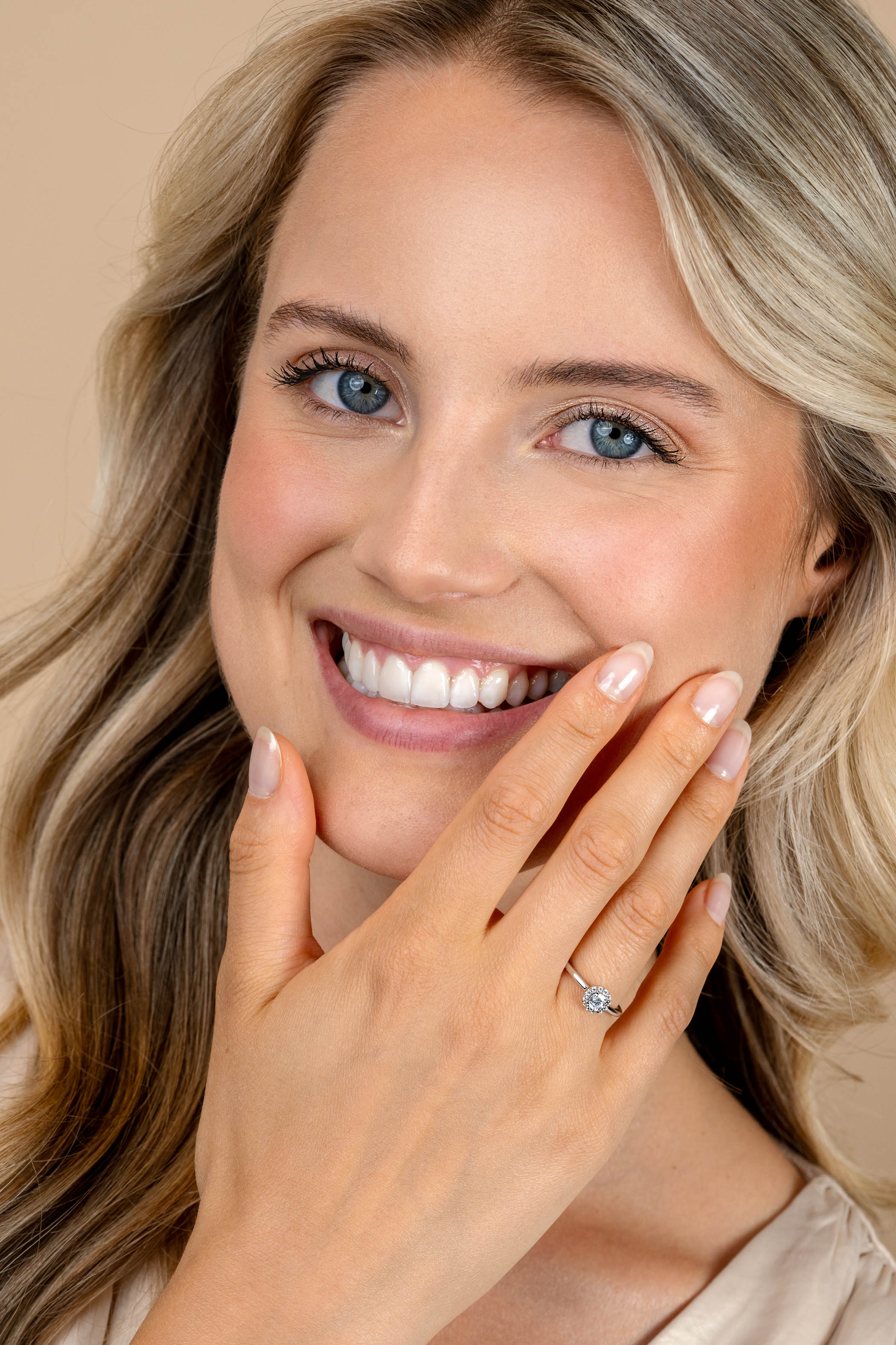 ZINZI silver entourage engagement ring set with white zirconia and a small heart on the side ZIR2697