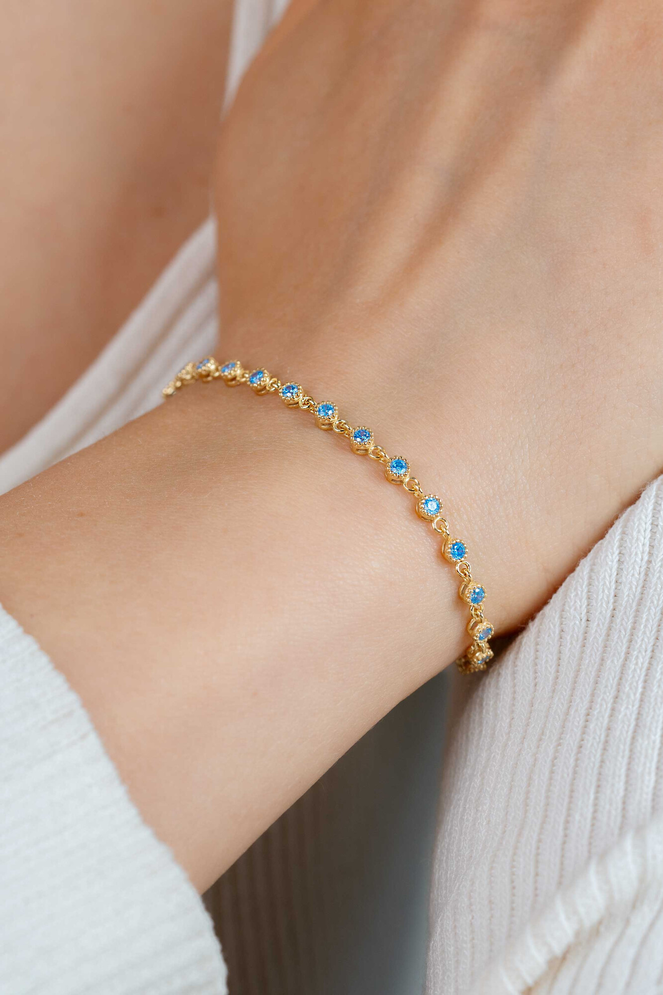 ZINZI zlv. armband gg.verg. fantasie blauwe zirc.