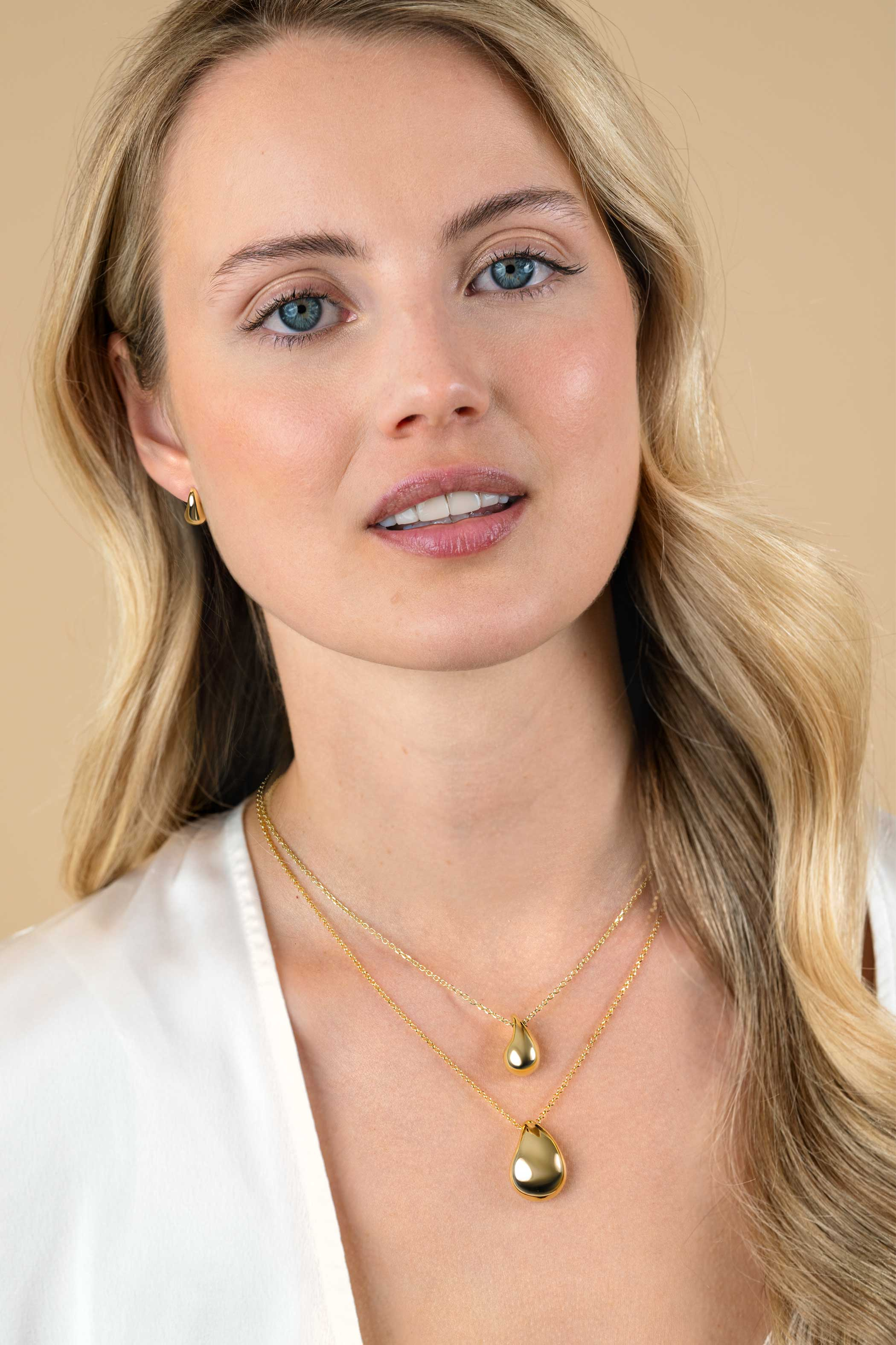 11mm ZINZI gold plated silver stud earrings in organic teardrop shape ZIO2636G