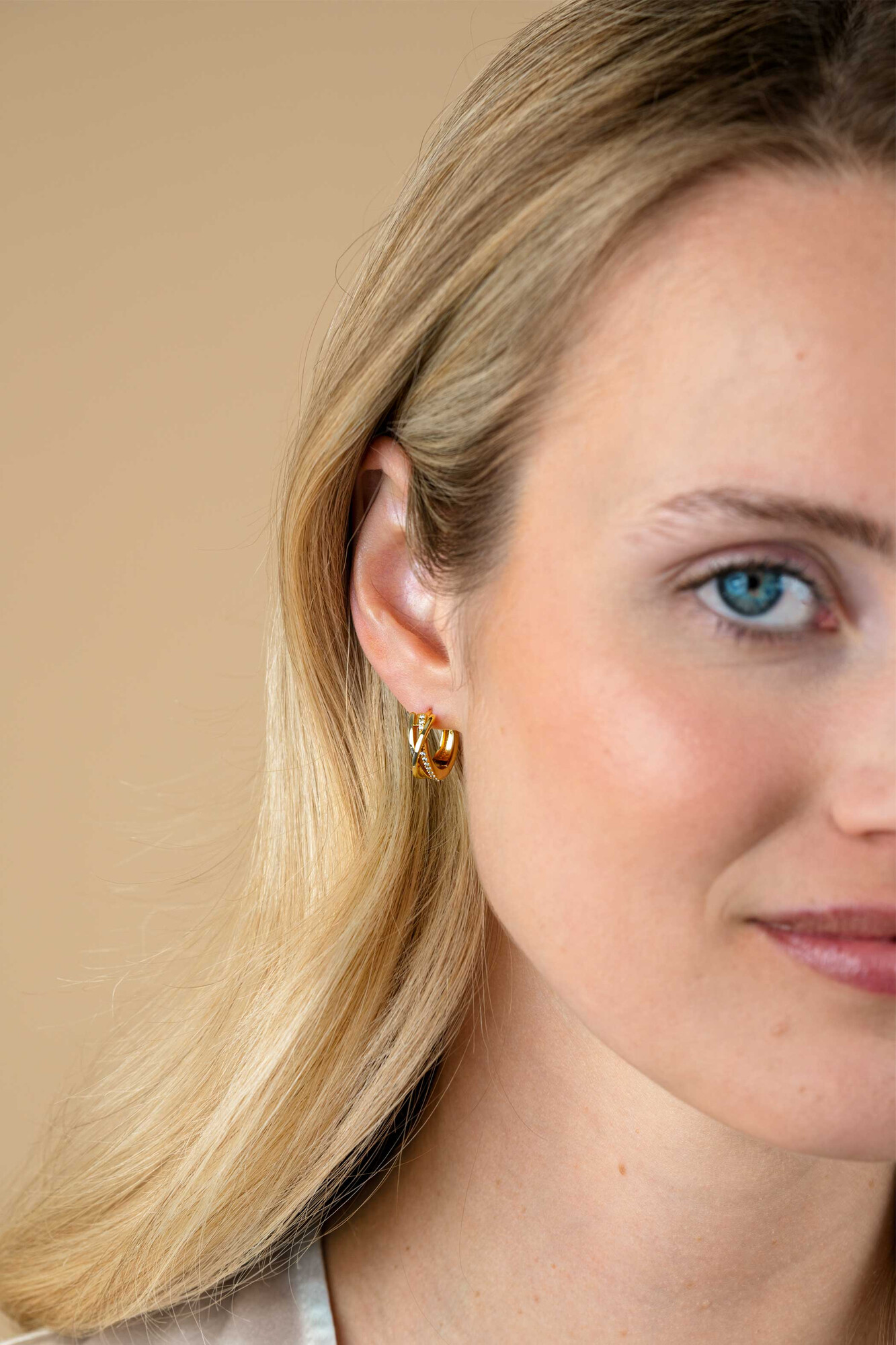 16mm ZINZI gold plated silver cross-over hoops 5.5mm wide set with white zirconia ZIO1774Y