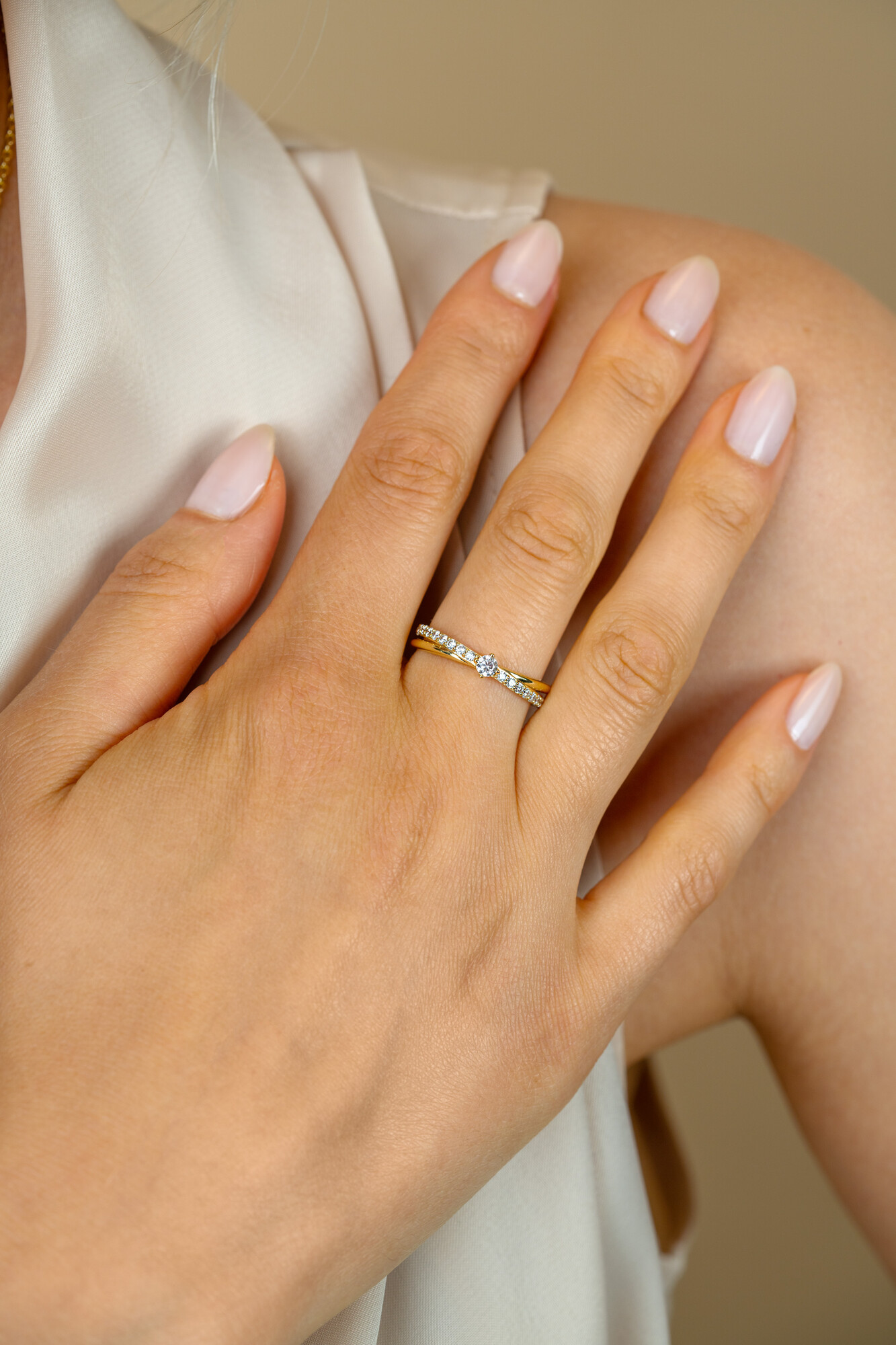 ZINZI zlv. ring gg.verg.cross-over met ziconia's mt.62