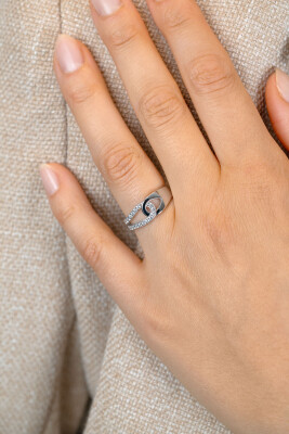 ZINZI zlv.ring verbonden druppelvorm zirc./glad mt.62